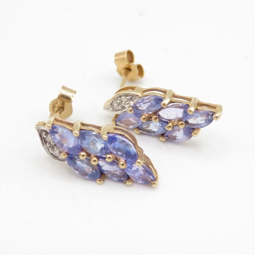 136 - 9ct gold tanzanite & diamond cluster earrings (1.7g)