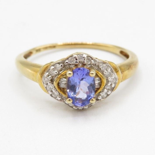 147 - 9ct gold tanzanite & diamond halo ring (2.1g) Size  O 1/2