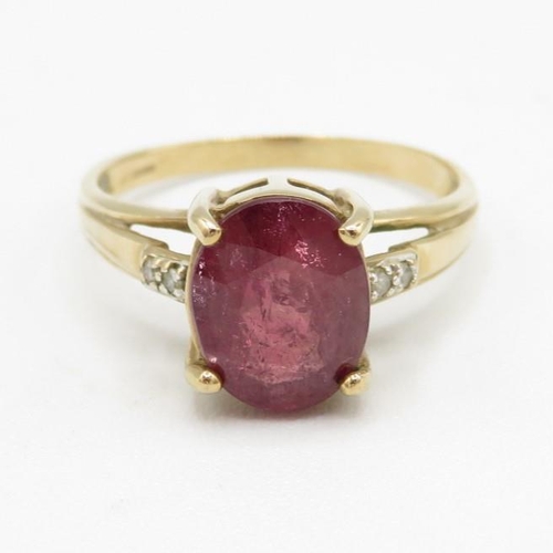 156 - 9ct gold ruby & diamond solitaire ring (3g) Size  P 1/2