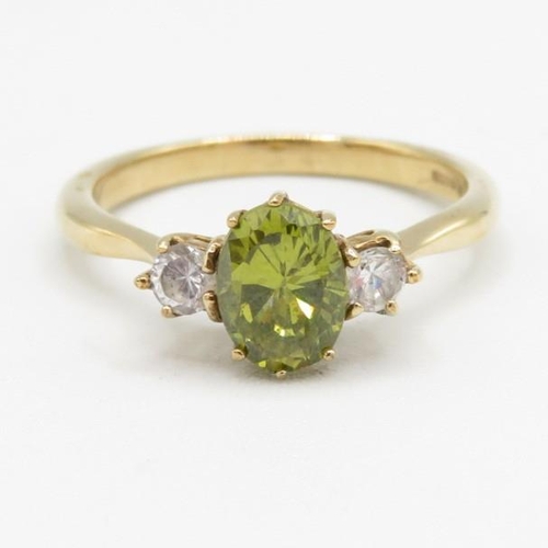 157 - 9ct gold green & white CZ three stone ring (3.6g) Size  T