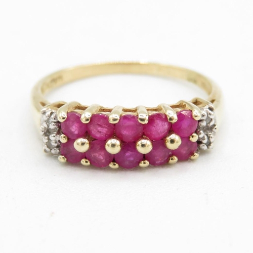 64 - 9ct gold ruby & diamond half eternity ring (2.1g) Size  P