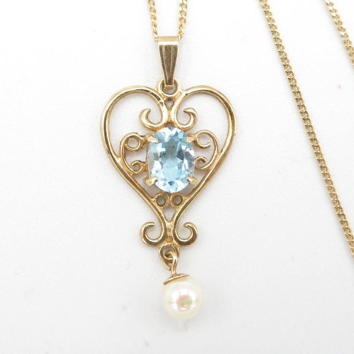 66 - 9ct gold vintage blue topaz & cultured pearl pendant (2.4g)