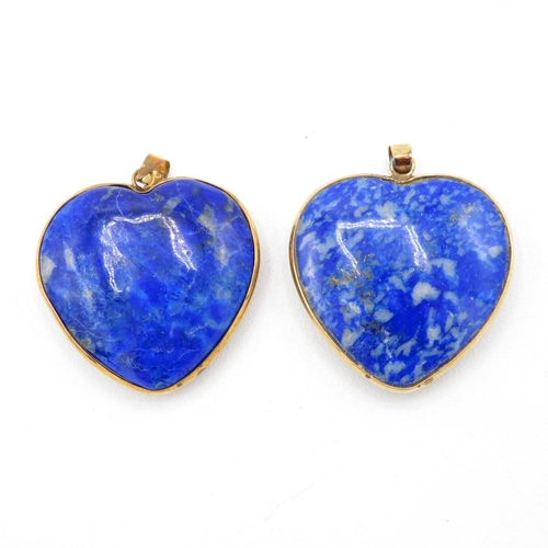 69 - 2x 9ct gold heart shaped lapis pendants (12.6g)