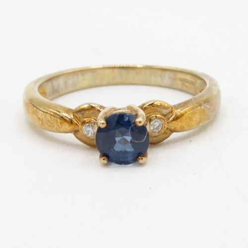 77 - 9ct gold blue gemstone & diamond solitaire ring (2.4g) Size  N