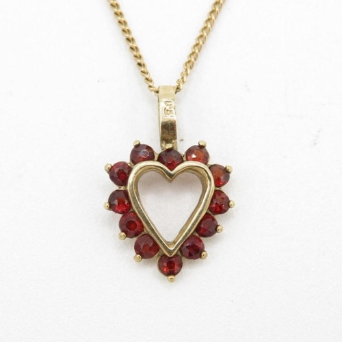 83 - 9ct gold garnet heart pendant & chain (2.9g)