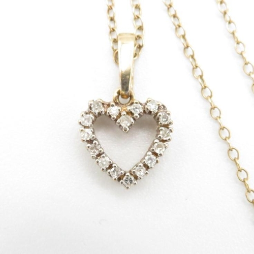 85 - 9ct gold diamond heart pendant & chain (1.9g)