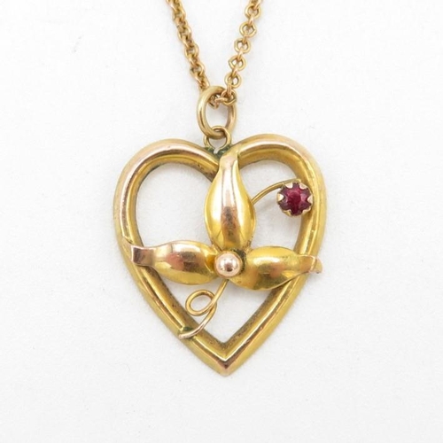 91 - 9ct gold garnet floral pendant & chain (3.4g)