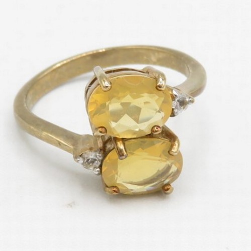 76 - 9ct gold white & yellow gemstone crossover ring (3.2g) Size  N