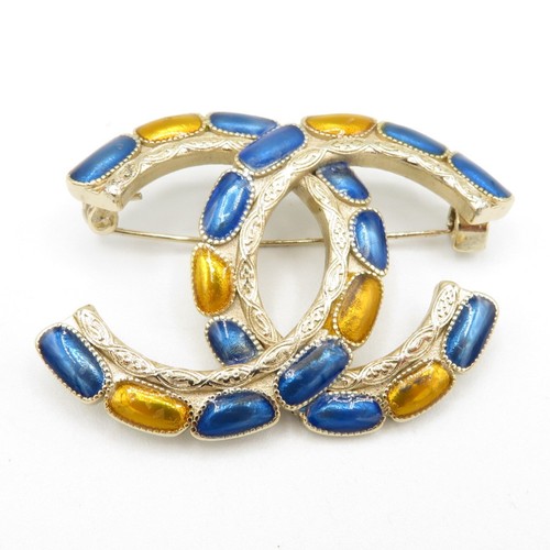 160 - Chanel logo gold tone brooch, as seen (23g)