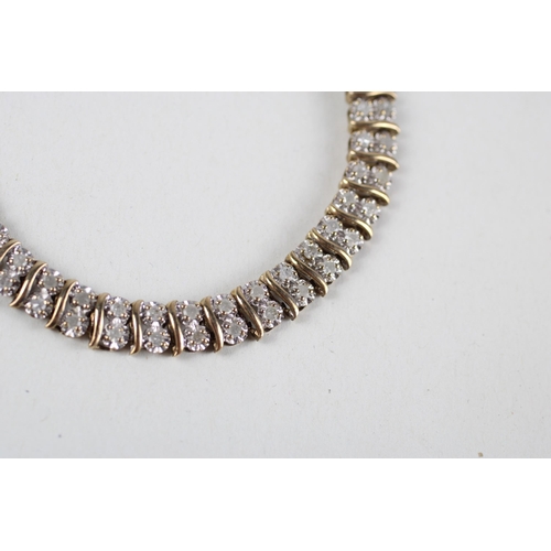 104 - 9ct gold diamond bracelet (9.7g)