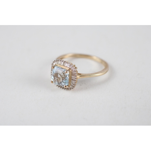 107 - 9ct gold aquamarine & diamond halo ring (2.3g) Size  O 1/2