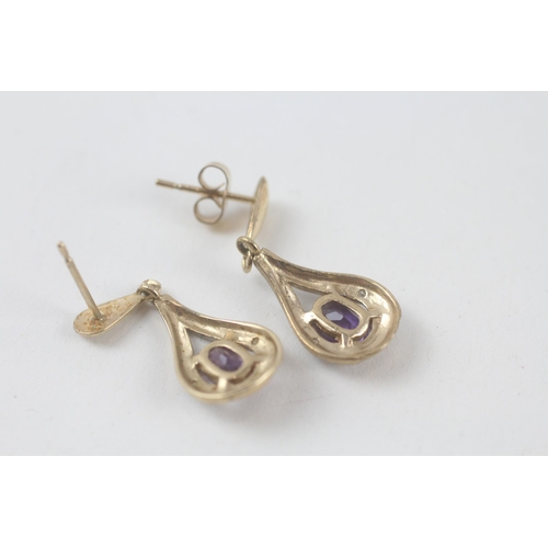 110 - 2x 9ct gold amethyst & diamond earrings (3.7g)