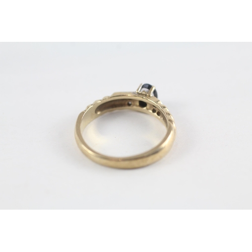 124 - 9ct gold sapphire & diamond ring (2.9g) Size  O