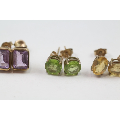 131 - 3 x 9ct gold gemstone set stud earrings inc. citrine, amethyst & peridot (4.6g)