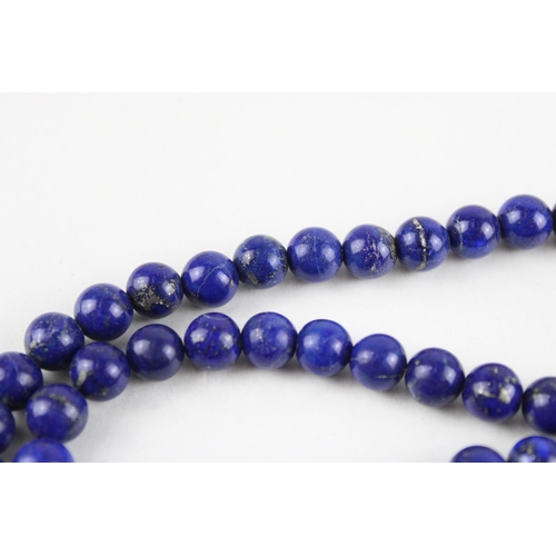 139 - 14ct gold lapis bead necklace (60.3g)