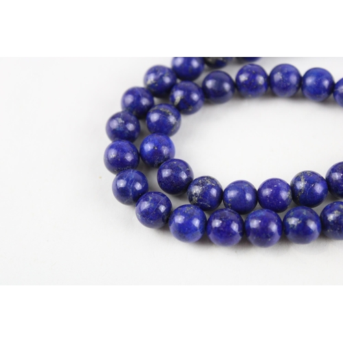 139 - 14ct gold lapis bead necklace (60.3g)