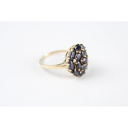 143 - 9ct gold sapphire cluster ring (3.3g) Size  R