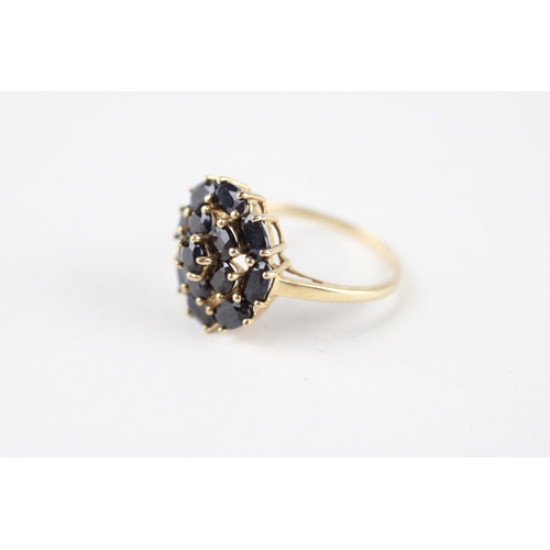 143 - 9ct gold sapphire cluster ring (3.3g) Size  R