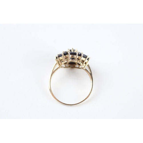 143 - 9ct gold sapphire cluster ring (3.3g) Size  R