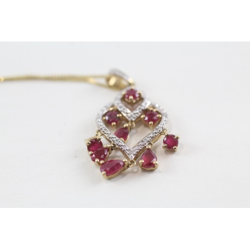 149 - 9ct gold ruby & diamond drop pendant & chain (3g)