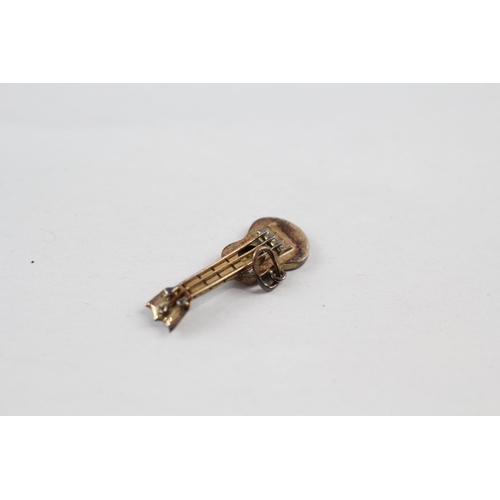 167 - 16ct gold guitar charm (0.8g)