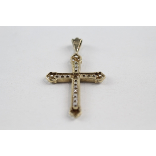 171 - 9ct gold diamond cross pendant (1.5g)