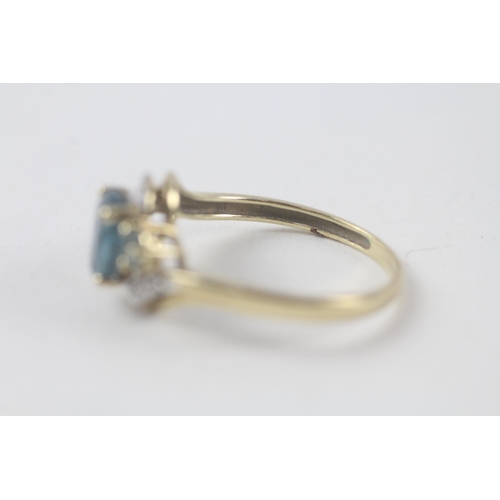 198 - 9ct gold blue topaz & diamond ring (2.3g) Size  R