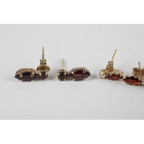 62 - 3 x 9ct gold garnet & clear gemstone earrings (2.6g)