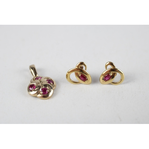 64 - 2 x 9ct gold ruby pendant & stud earrings (2.3g)