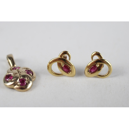 64 - 2 x 9ct gold ruby pendant & stud earrings (2.3g)