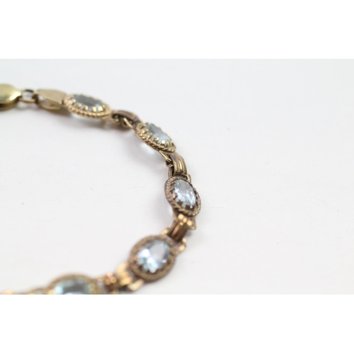 66 - 9ct gold blue topaz bracelet (7.5g)