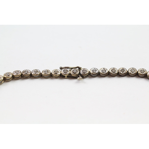 68 - 9ct gold diamond line bracelet (5.5g)