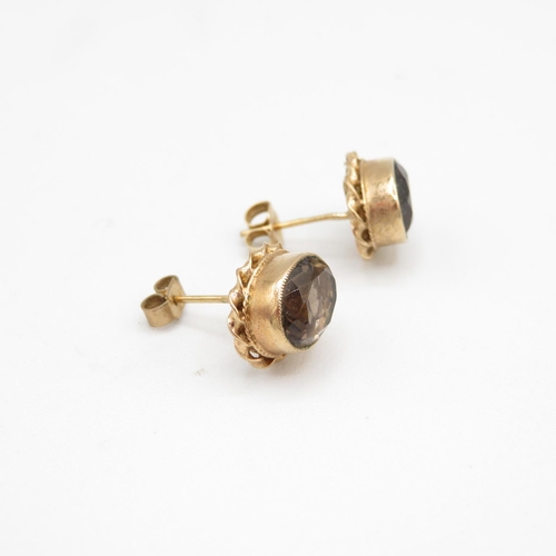 91 - 3 x 9ct gold smoky quartz & citrine stud earrings (5.8g)