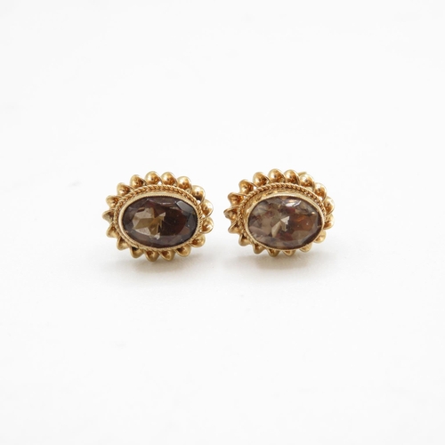 91 - 3 x 9ct gold smoky quartz & citrine stud earrings (5.8g)