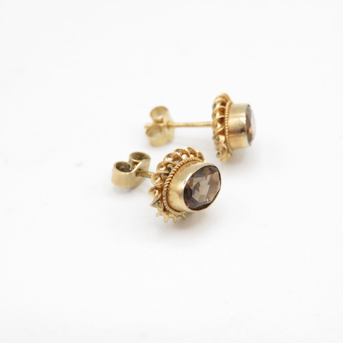 91 - 3 x 9ct gold smoky quartz & citrine stud earrings (5.8g)