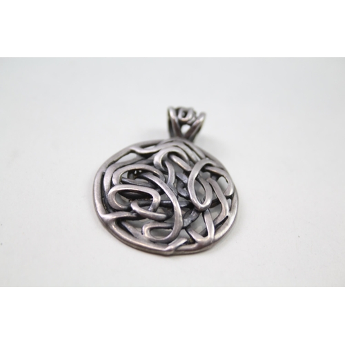 208 - Two silver Scottish/Celtic pendants (20g)