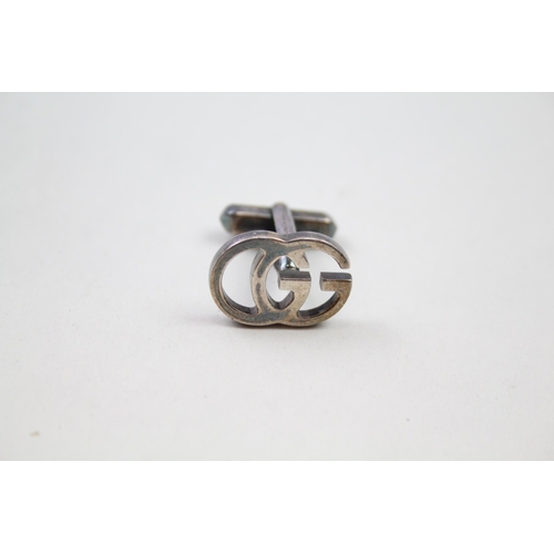 235 - Pair of silver cut work cufflinks by designer Gucci (10g)