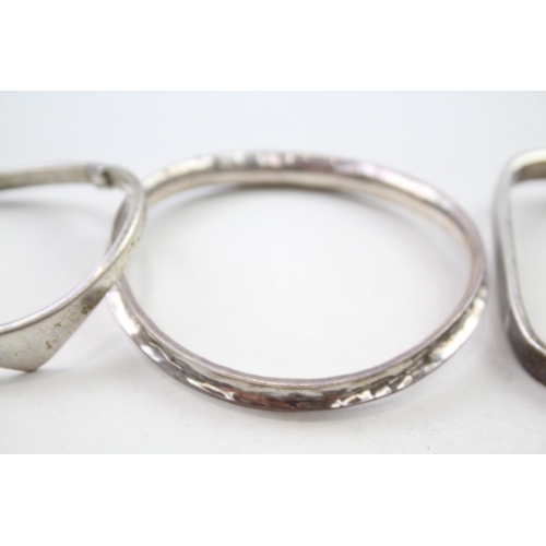 155 - Three silver modernist bangles (91g)