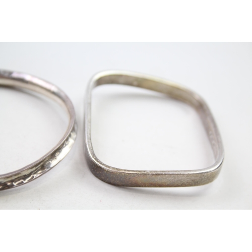 155 - Three silver modernist bangles (91g)