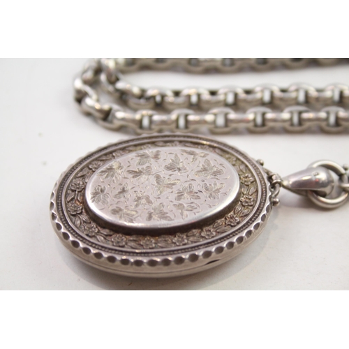 193 - Silver antique locket on long length chain (133g)