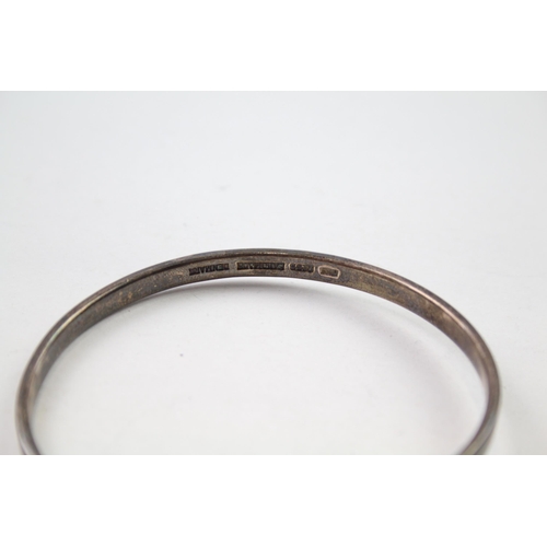 196 - Silver modernist cross over bangle made in Denmark (24g)