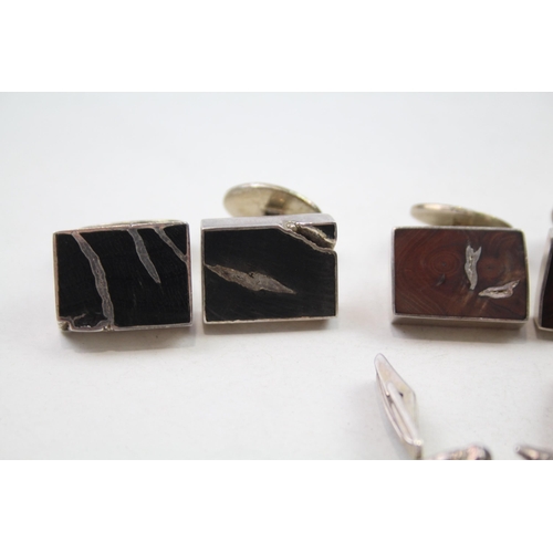 204 - A collection of silver cufflinks including Lapis Lazuli (74g)