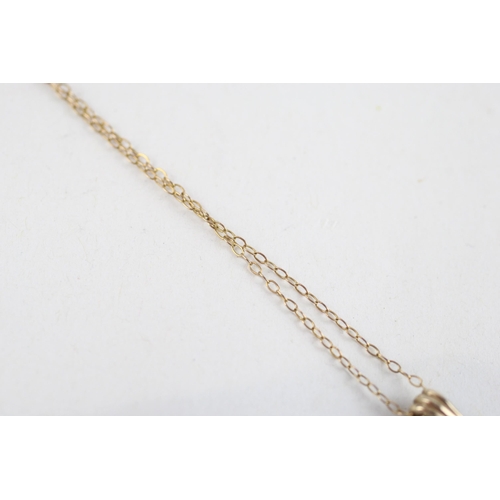 108 - 9ct gold diamond pendant & chain (1.1g)