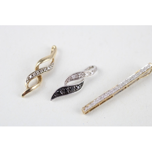 122 - 3x 9ct gold diamond pendants (2g)