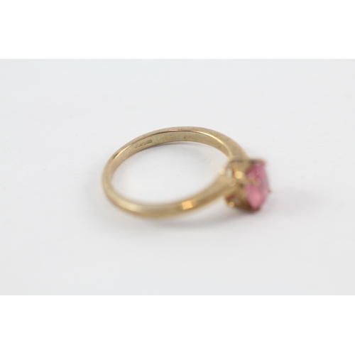 147 - 9ct gold glass filled ruby solitaire ring (2.6g) Size  O