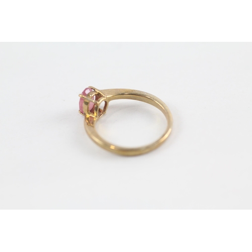 147 - 9ct gold glass filled ruby solitaire ring (2.6g) Size  O