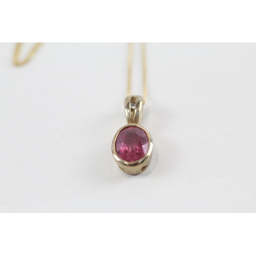 148 - 9ct gold ruby pendant & chain (2.2g)