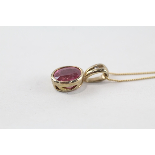 148 - 9ct gold ruby pendant & chain (2.2g)