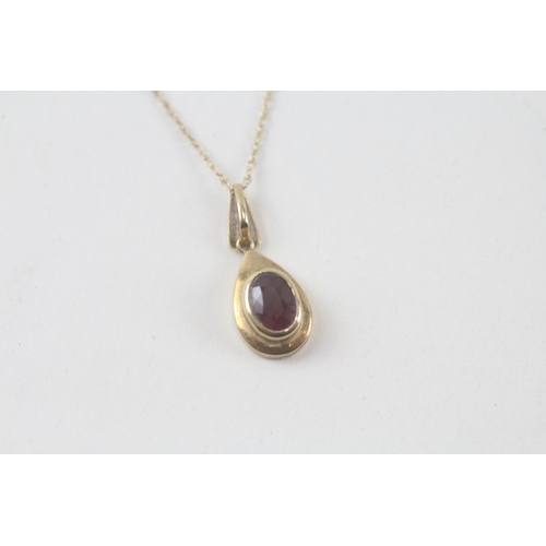 61 - 9ct gold ruby pendant & chain (1.4g)