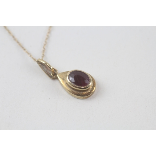 61 - 9ct gold ruby pendant & chain (1.4g)